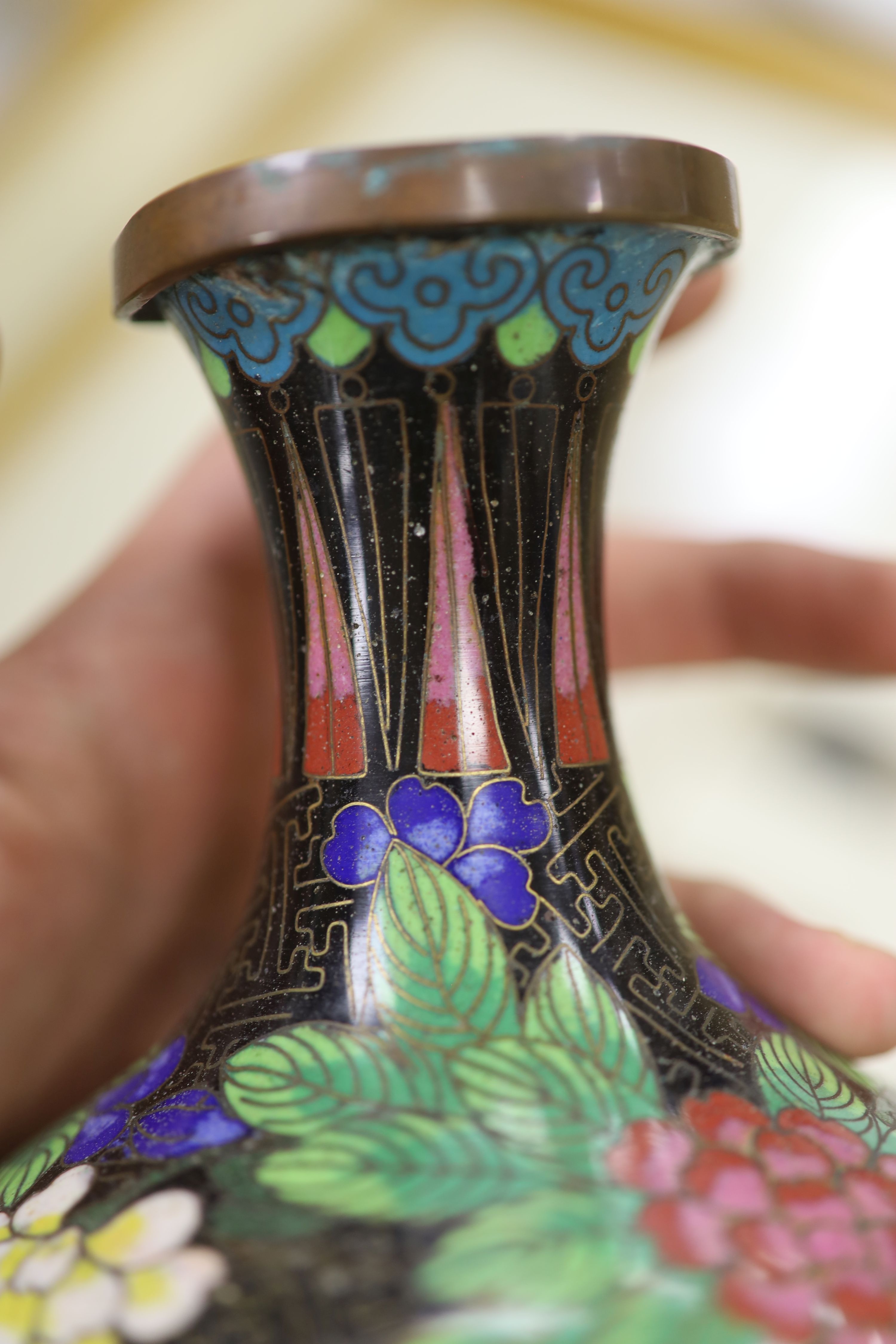 Three Chinese blue and white vases, a cloisonne enamel vase, another vase and a soapstone figure